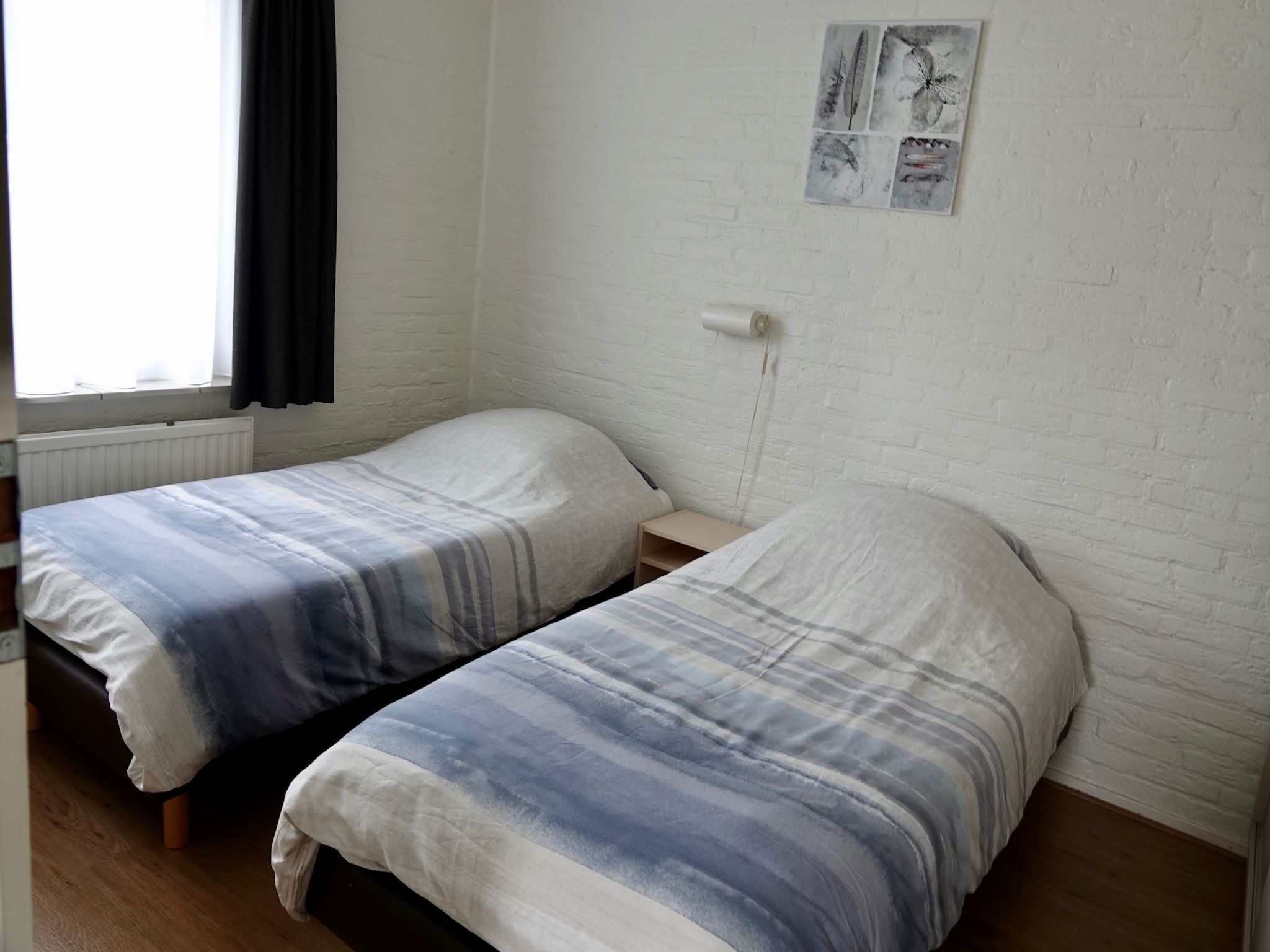 Een slaapkamer van Calm Breeze in Noordwijkerhout
