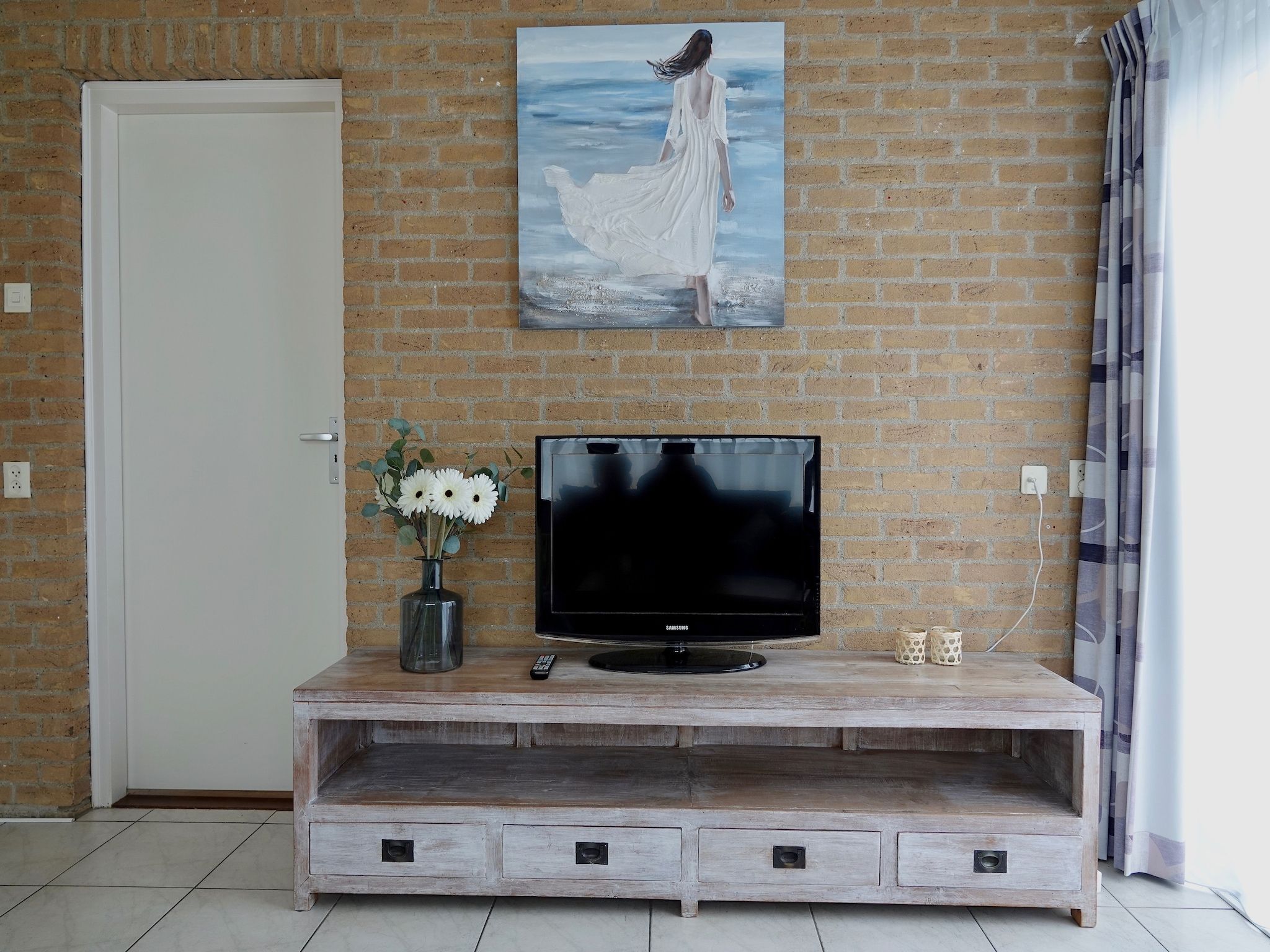 De woonkamer van Calm Breeze in Noordwijkerhout