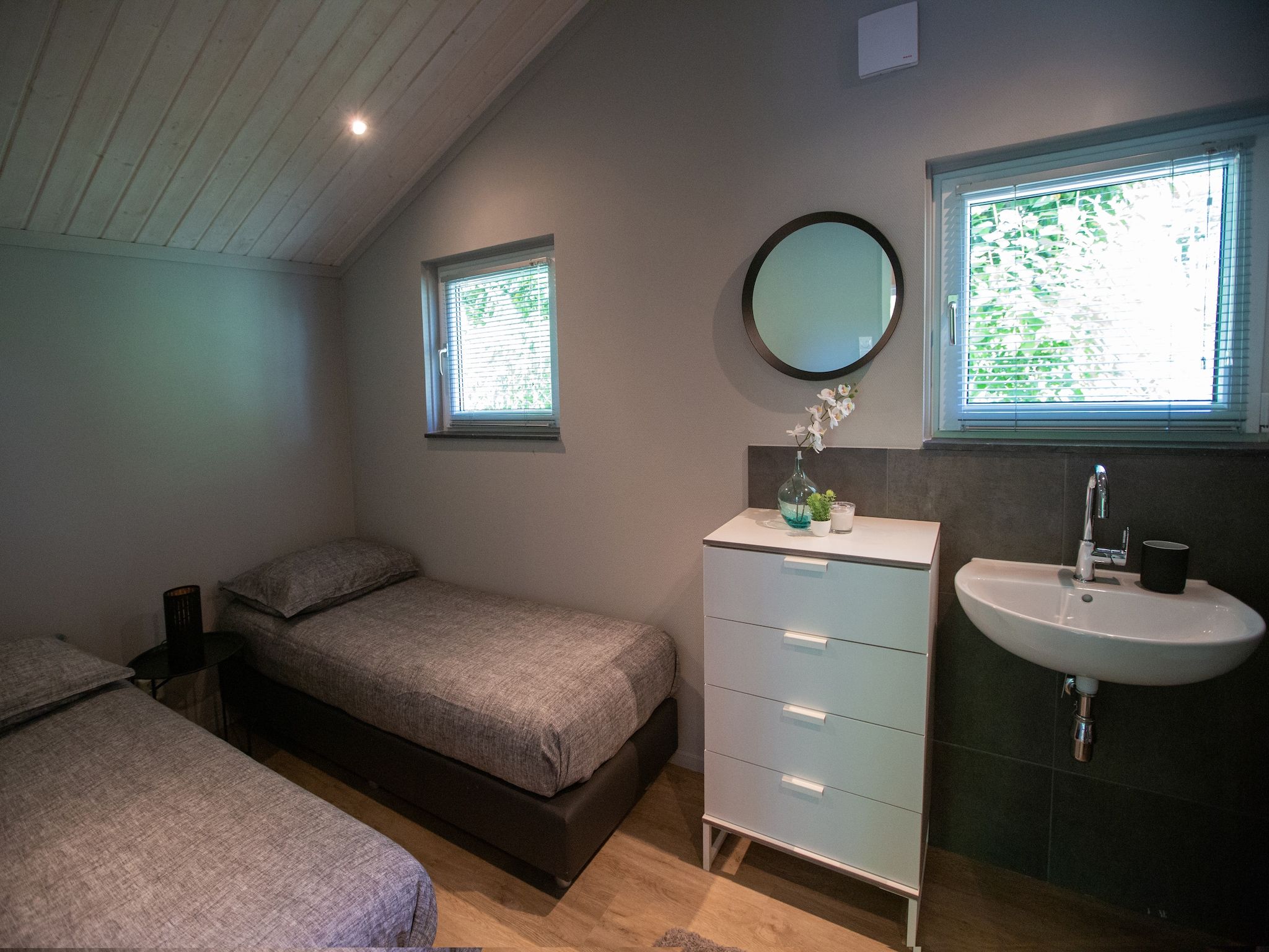 Een slaapkamer van Vakantiepark Latour 1 in Oirschot