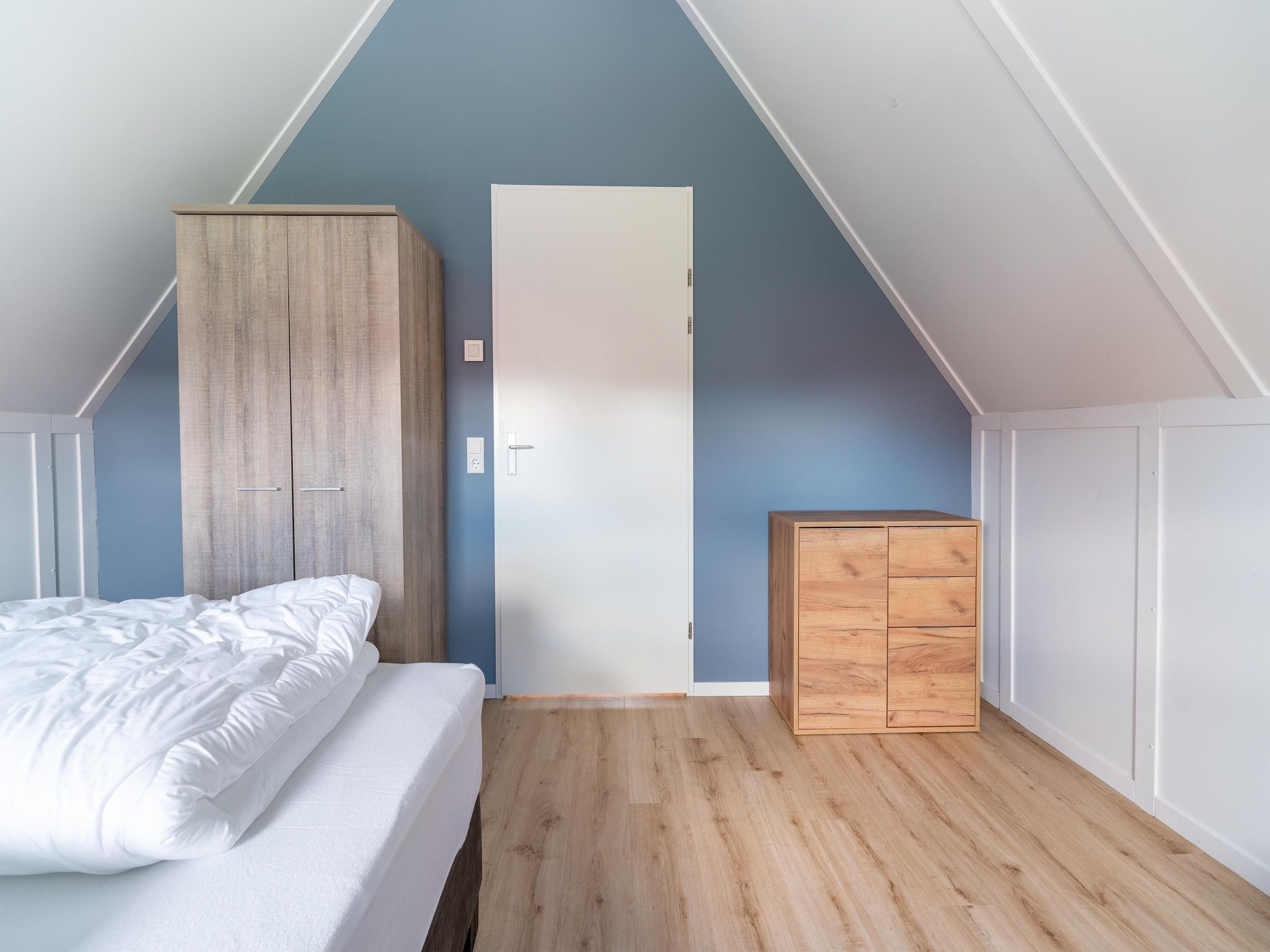 Een slaapkamer van De Kievit Huis Nr 36 in Scherpenisse