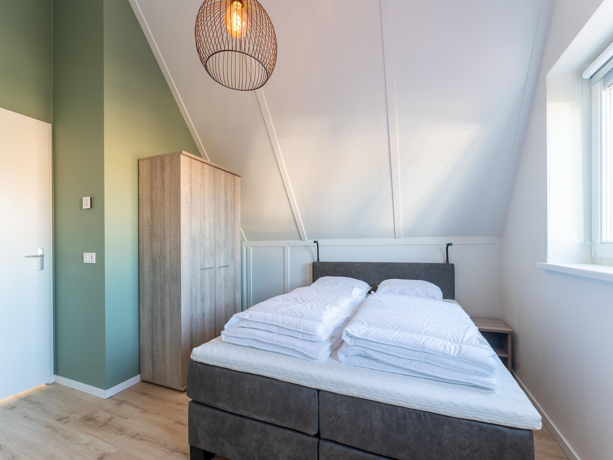 Een slaapkamer van De Smient Huis  Nr 42 in Scherpenisse