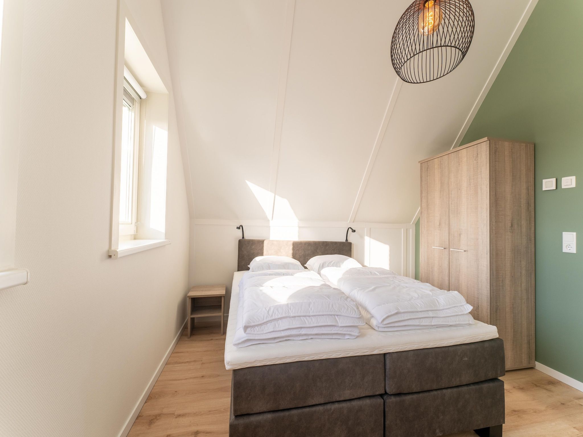Een slaapkamer van De Smient Huis  Nr 42 in Scherpenisse
