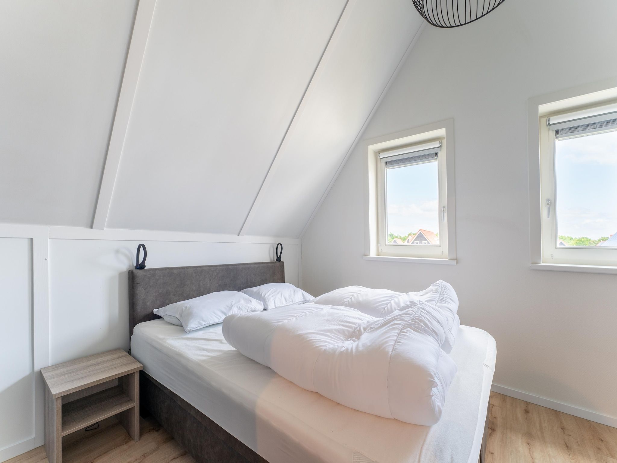 Een slaapkamer van Wulpdal Huis Nr 51 in Scherpenisse