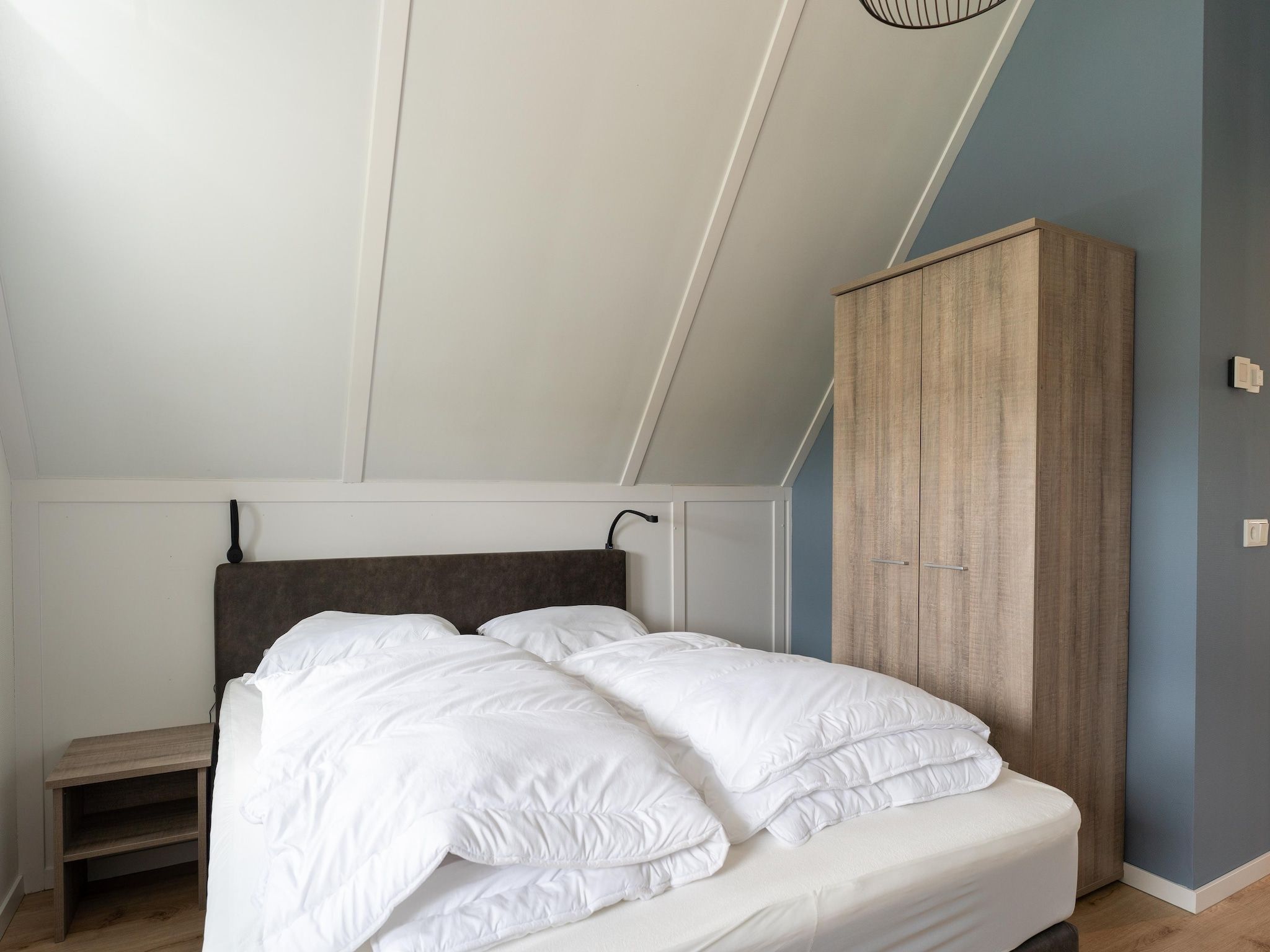 Een slaapkamer van Wulpdal Huis Nr 51 in Scherpenisse