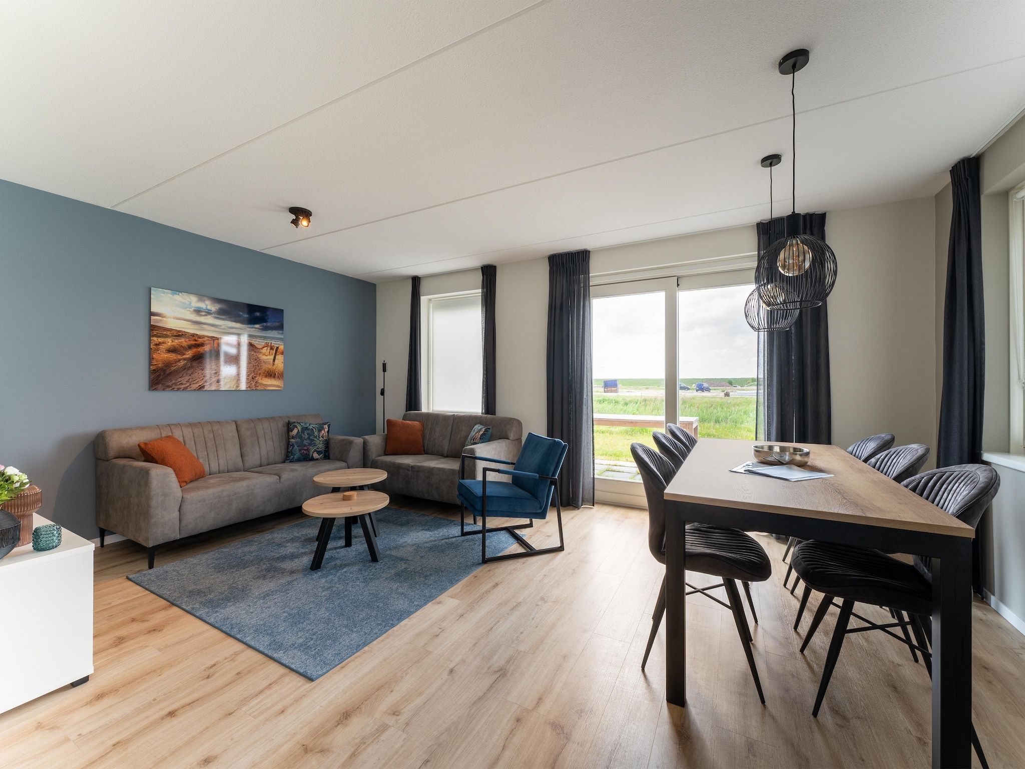 De woonkamer van Wulpdal Huis Nr 51 in Scherpenisse