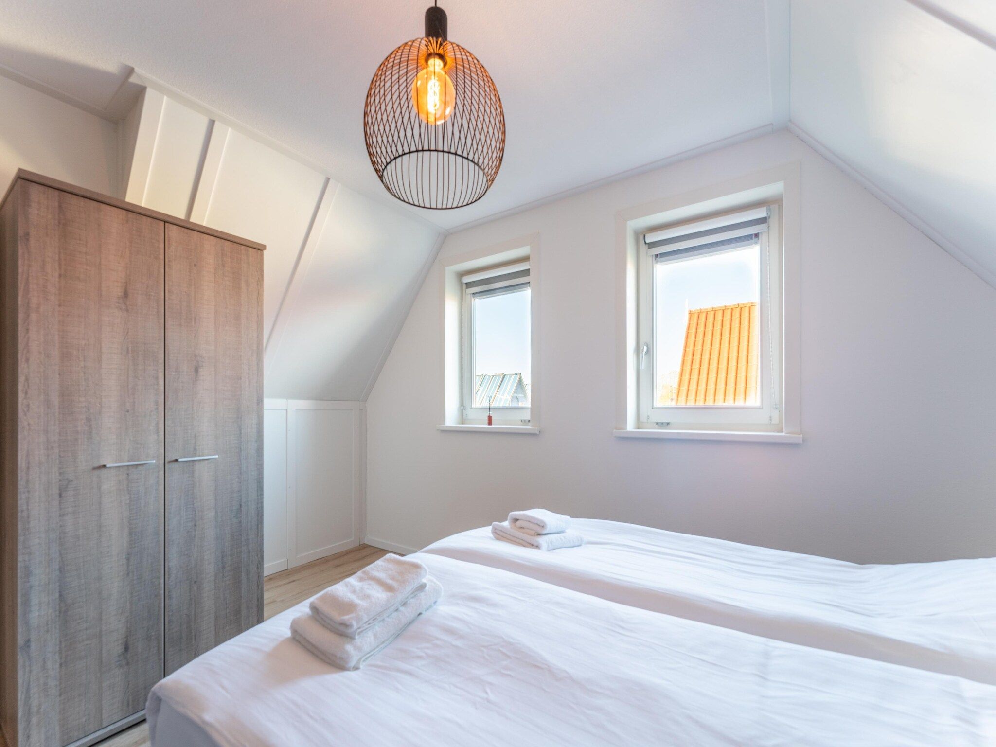 Een slaapkamer van De Roodborst Huis Nr 31 in Scherpenisse