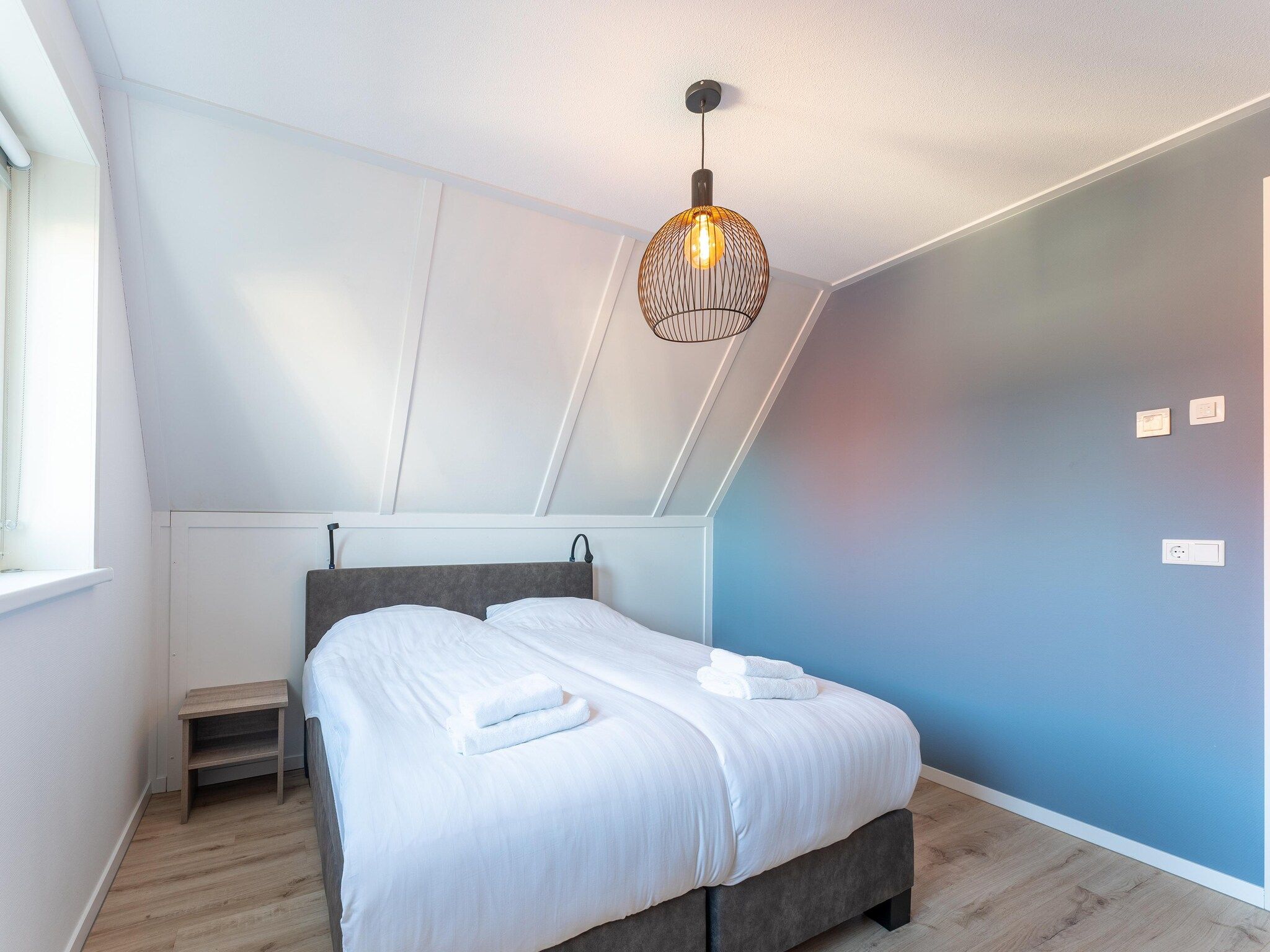Een slaapkamer van De Roodborst Huis Nr 31 in Scherpenisse