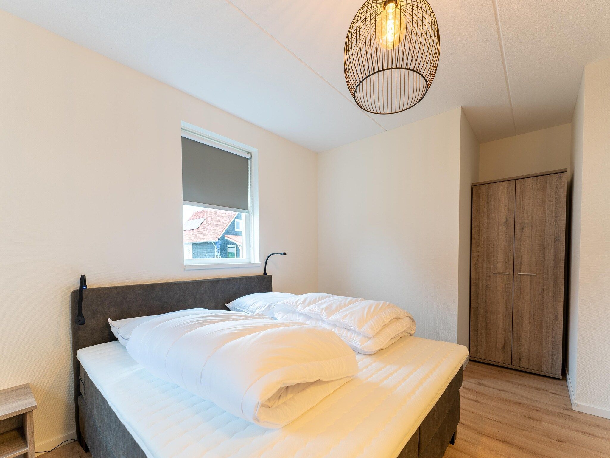 Een slaapkamer van De Albatros Huis Nr 49 in Scherpenisse
