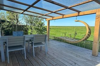 Chalet met vaatwasser vlakbij de Waddenzee in Hippolytushoef