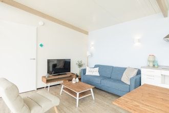 Comfortabele lodge vlakbij het strand in Hollum