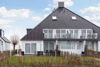 Appartement Sneekermeer met watersport in Offingawier