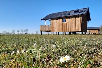 Lodge in Drenthe met uitzicht veranda in Ruinerwold