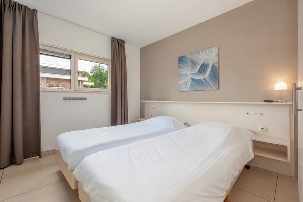 Slaapkamer - Moderne bungalow met wasmachine in Arcen (3)