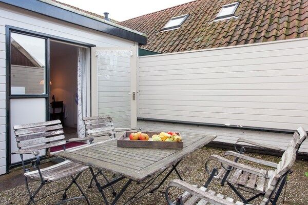 Terras - Huisje in Nes-Ameland bij Kust in Nes-Ameland (5)