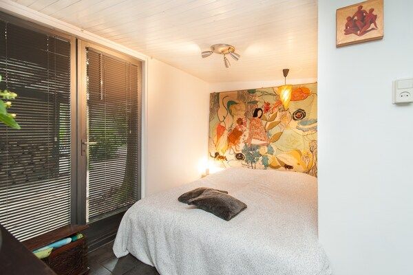 Slaapkamer - Vakantiehuis Bergen bij Bos en Strand in Bergen (4)