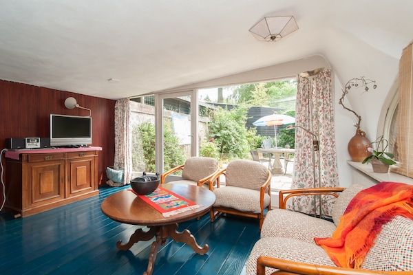 Woonkamer - Vakantiehuis Bergen bij Bos en Strand in Bergen (1)