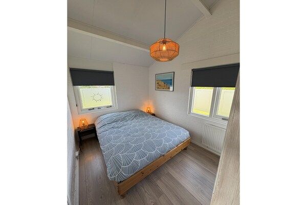 Slaapkamer - Luxueuze villa in Noord-Holland vlak bij zee in Egmond aan den Hoef (5)