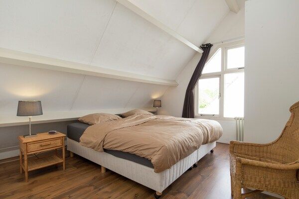Slaapkamer - Vakantiehuis in Noordwijkerhout bij Bos & Meer in Noordwijkerhout (4)