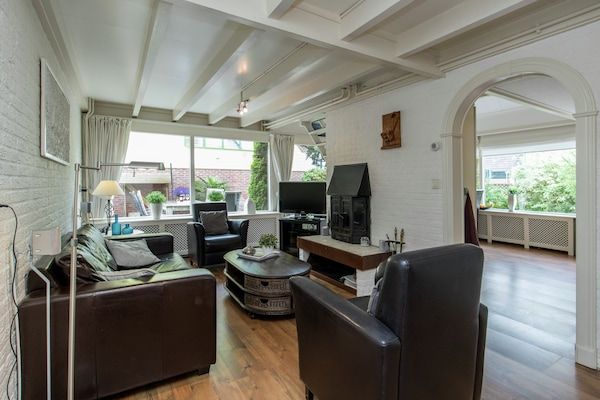 Woonkamer - Vakantiehuis in Noordwijkerhout bij Bos & Meer in Noordwijkerhout (1)