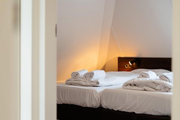 Slaapkamer - Villa in Nederland met ruime tuin in Voorthuizen (4)