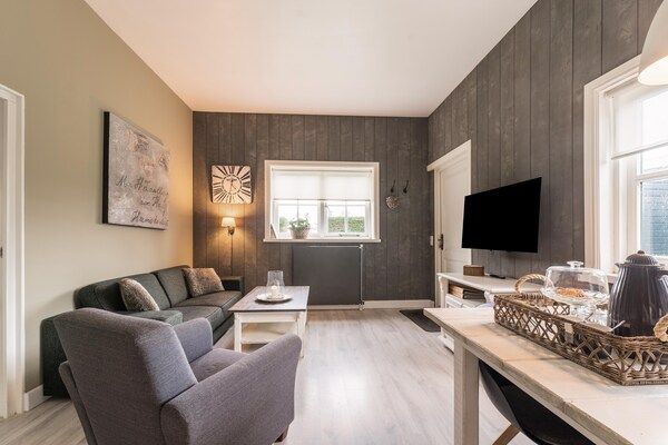 Woonkamer - Vakantiehuis Egmond bij Duinstranden in Egmond-Binnen (1)