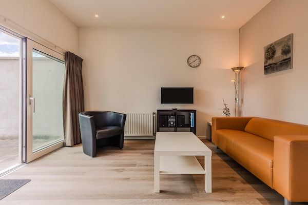 Woonkamer - Bungalow nabij Valkenburg in Walem (2)