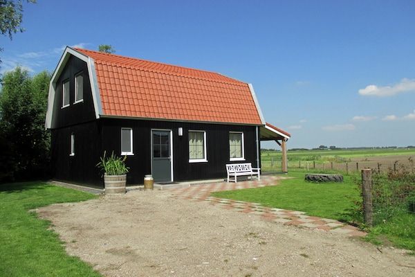 Buitenkant - Levendige cottage in Schellinkhout bij het meer in Schellinkhout (1)