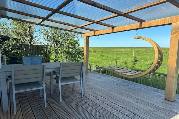 Terras - Chalet met vaatwasser vlakbij de Waddenzee in Hippolytushoef (1)