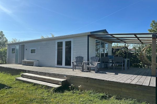 Buitenkant - Chalet met vaatwasser vlakbij de Waddenzee in Hippolytushoef (2)