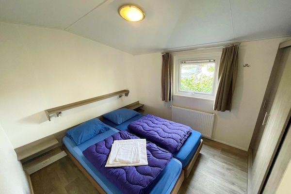 Slaapkamer - Appartement in Nederland met uitzicht in Elst (4)