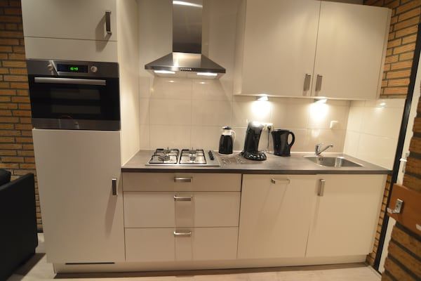 Keuken - Bungalow in Limburg bij natuurgebieden in Stramproy (4)