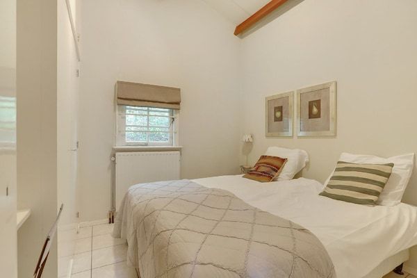 Slaapkamer - Villa in Sandberghe met Sauna en Comfort in Uden (4)