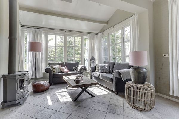 Woonkamer - Luxe villa in De Pier met sauna in Uden (1)