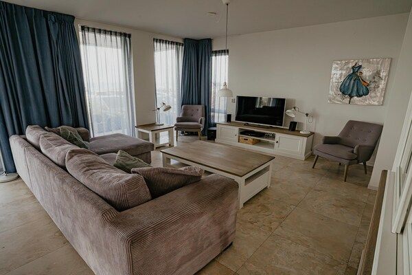 Woonkamer - Appartement in Egmond aan Zee bij Strand in Egmond aan zee (1)