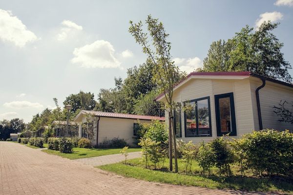 Buitenkant - Chalet Retreat aan de rivier in Zuna (1)