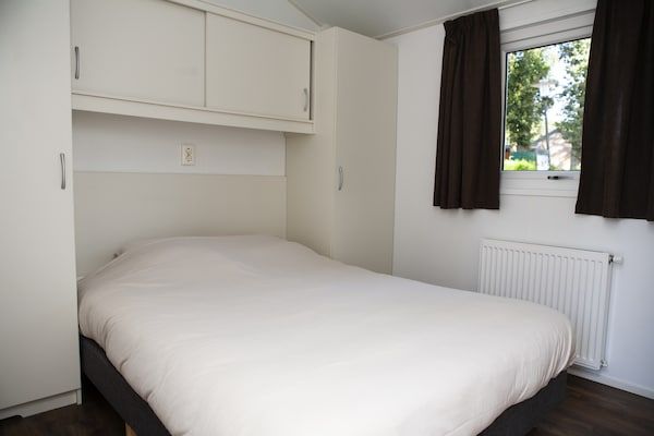 Slaapkamer - Wellness Chalet in de Natuur in Voorthuizen (4)