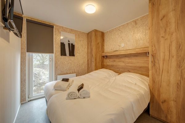 Slaapkamer - Chalet in Nederland bij het strand in Den Haag (4)