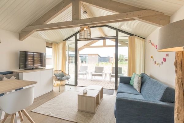 Woonkamer - Ameland Lodge met Veranda in Hollum (1)