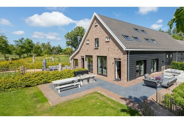 Buitenkant - Vakantiehuis bij Oranjezon Strand in Vrouwenpolder (1)