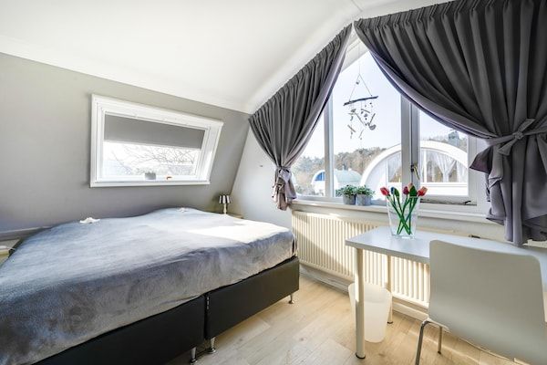 Slaapkamer - Vakantiehuis Noordwijk bij Strand & Sauna in Noordwijk (5)