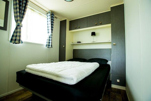 Slaapkamer - Chalet bij Drunense Duinen in Udenhout (3)