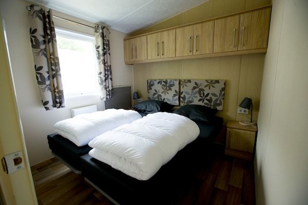 Slaapkamer - Lodge in Duinhoeve bij Duinen & Speeltuin in Udenhout (3)