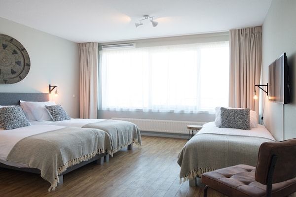 Slaapkamer - Appartement met zeezicht en balkon in Scheveningen (4)