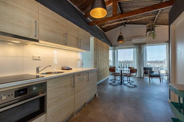 Keuken - Gezellig verblijf vlakbij het strand in Koudekerke (4)