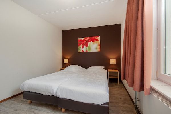 Slaapkamer - Villa in Arcen met douche & tuin in Arcen (5)