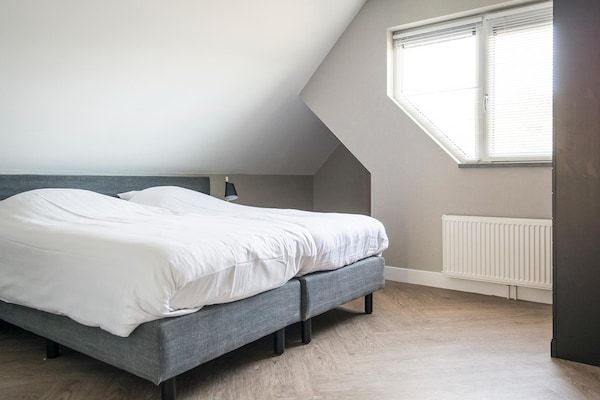 Slaapkamer - Moderne villa met een privéterras in De Cocksdorp in De Cocksdorp Texel (3)