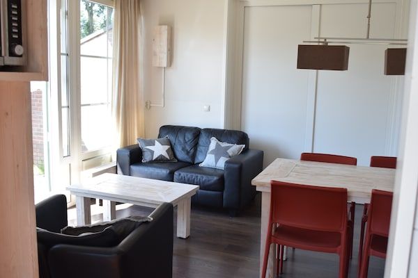 Woonkamer - Bungalow in Nederland met Tuinterras in Voorthuizen (5)