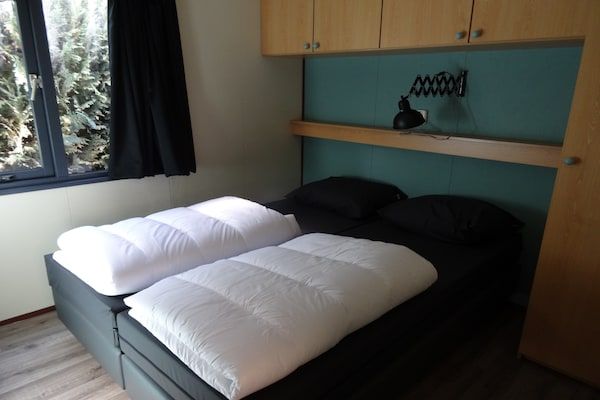 Slaapkamer - Chalet bij Loonse en Drunense Duinen in Udenhout (3)