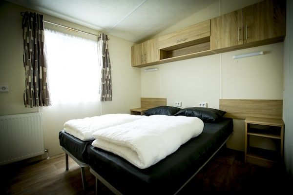 Slaapkamer - Chalet bij de Loonse en Drunense Duinen in Udenhout (2)