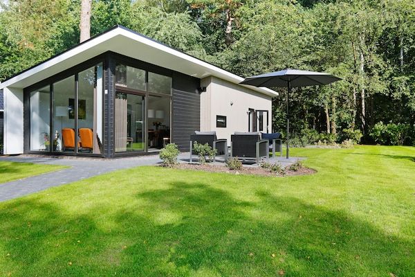 Buitenkant - Bos Lodge met heerlijke tuin in Markelo (5)